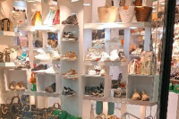 لوگوی فروشگاه کیف و کفش افتاب