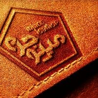 لوگوی فروشگاه مینو چرم