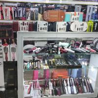 لوگوی فروشگاه آرایشی برقی رشیدی بانه